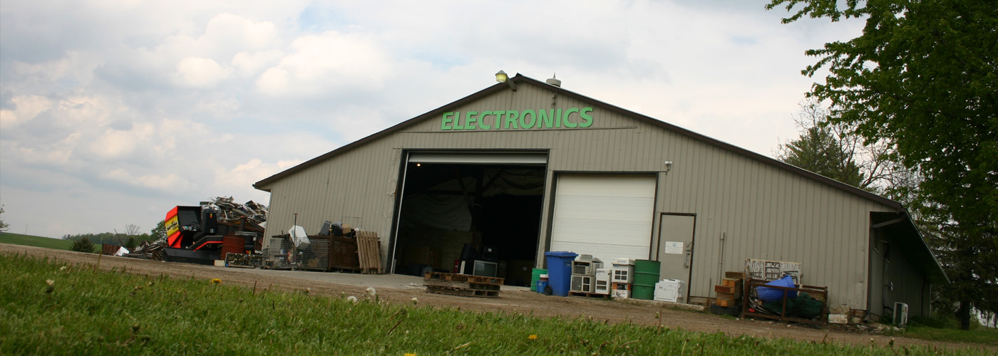 Dundee Electronic Recycling facility exterior with Electronics signage
